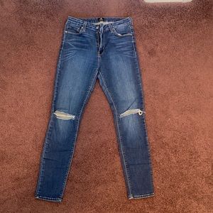 Just Black Skinny jeans with rips in knees Size 29